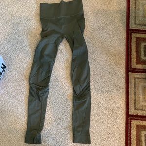 Alala Green Leggings with lots of detail